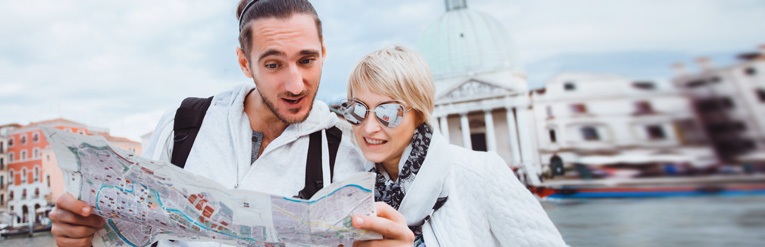 Tourists Looking At Map