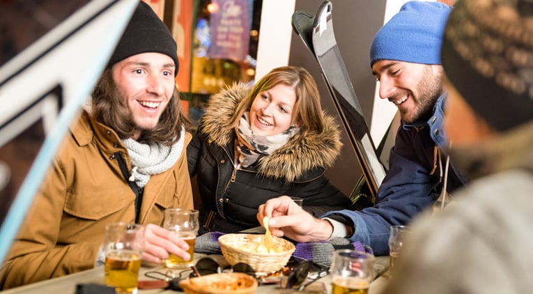 People eating on snowfields