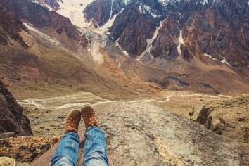 Traveller near mountains