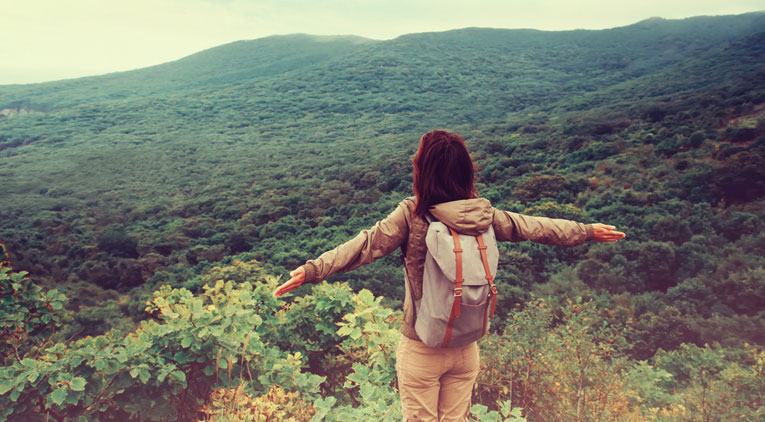 woman on hill top