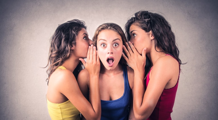 Women telling secrets