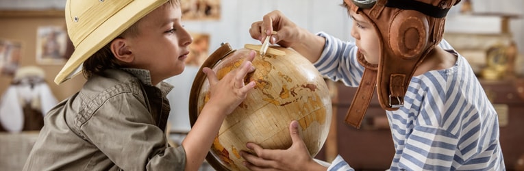 Kids playing with a globe