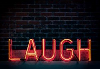 Neon laugh sign